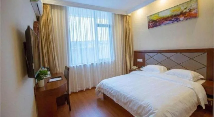 Bed in GreenTree Inn Wuxi Donggang Town Donghutang Shell Hotel