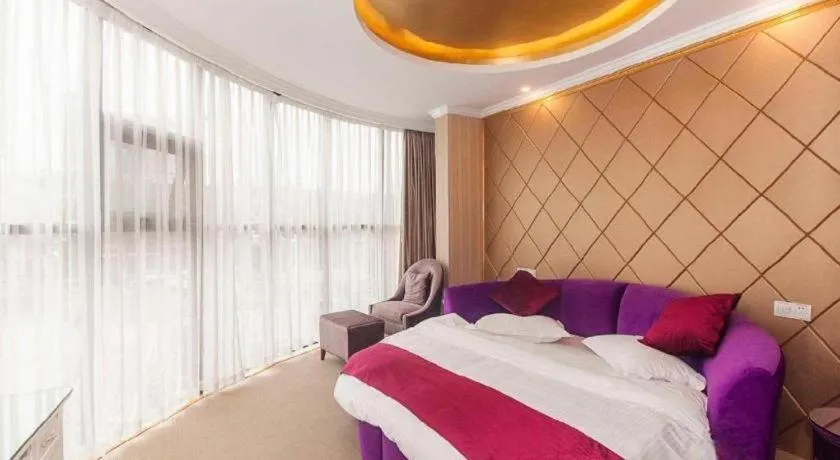 Bed in GreenTree Inn Wuxi Donggang Town Donghutang Shell Hotel