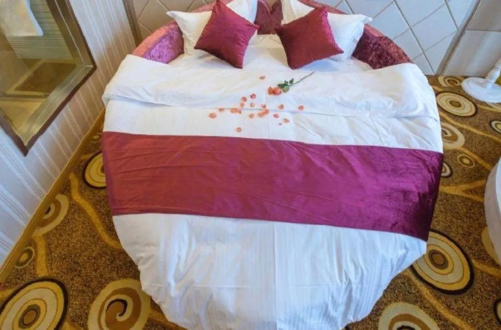 Bed in GreenTree Inn Wuxi Donggang Town Donghutang Shell Hotel