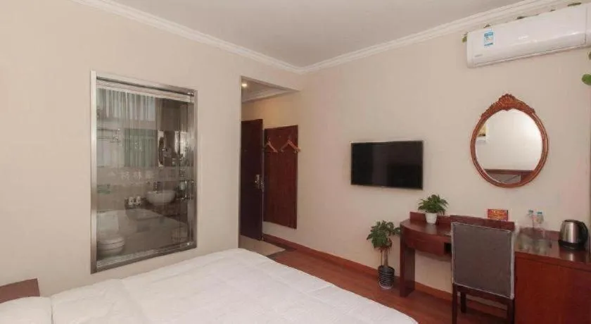 Bed in GreenTree Inn Wuxi Donggang Town Donghutang Shell Hotel