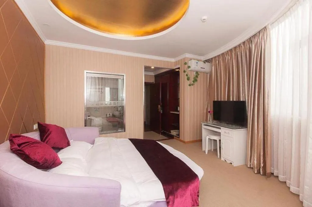 Bed in GreenTree Inn Wuxi Donggang Town Donghutang Shell Hotel