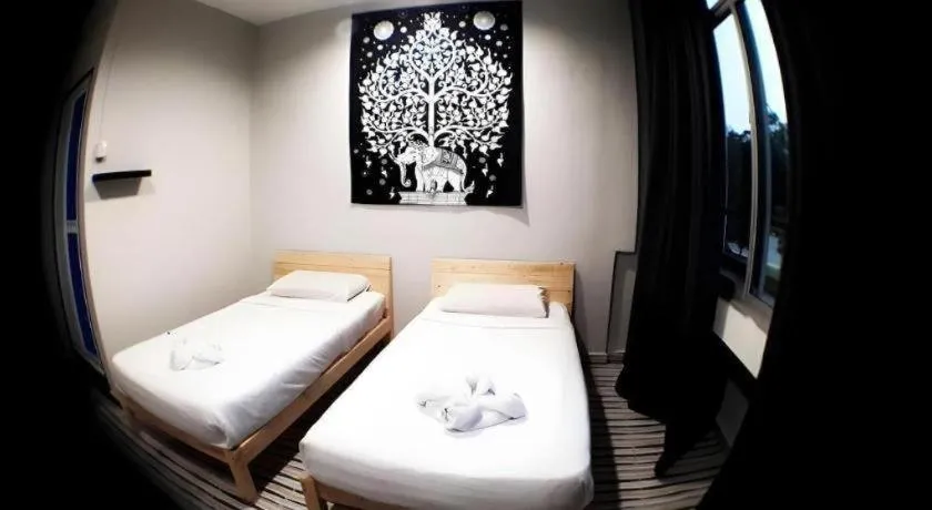 Bed in De Chukai Hotel