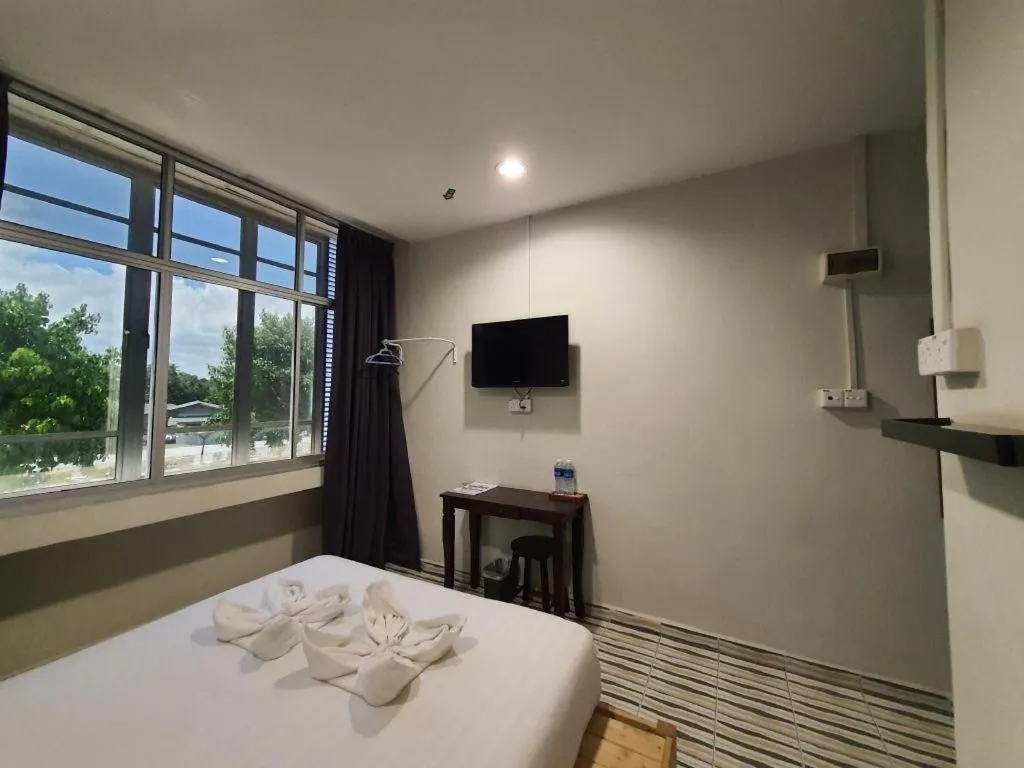 Bed in De Chukai Hotel