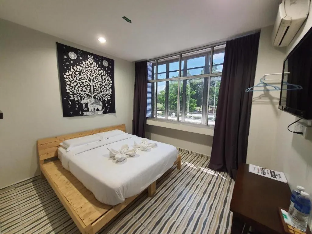 Bed in De Chukai Hotel