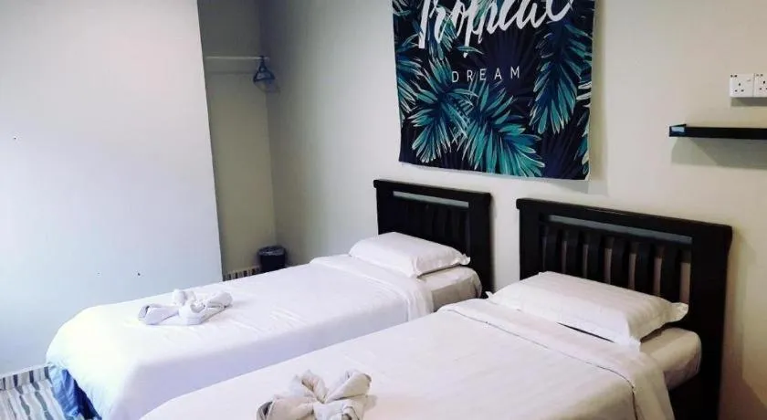 Bed in De Chukai Hotel