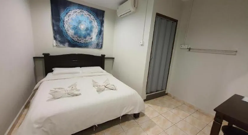 Bed in De Chukai Hotel