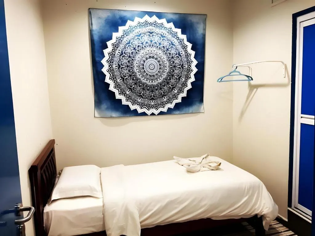 Bed in De Chukai Hotel