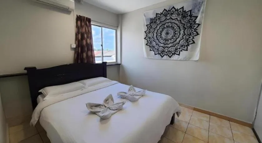 Bed in De Chukai Hotel