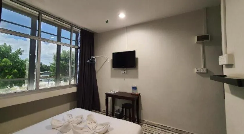 Bed in De Chukai Hotel