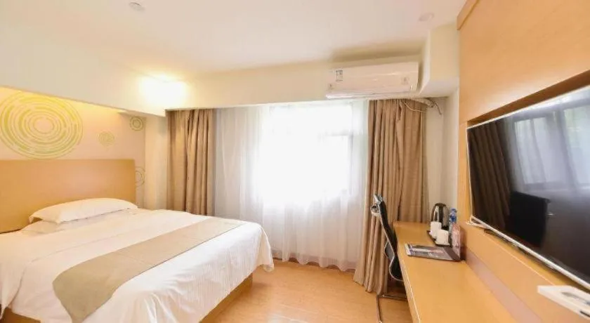 Bed in GreenTree Inn Huainan Shou County Zijin Road Express Hotel