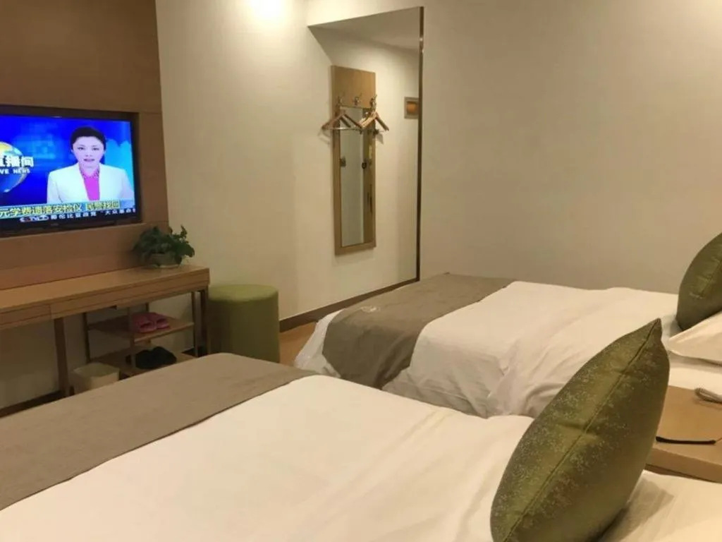 Bed in GreenTree Inn Huainan Shou County Zijin Road Express Hotel