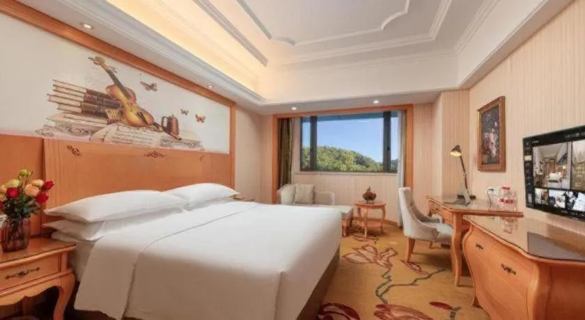 Bed in Vienna International Hotel Guangzhou Jichang Road Huangshi