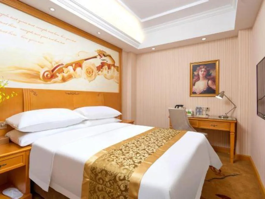 Bed in Vienna International Hotel Guangzhou Jichang Road Huangshi