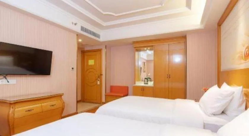Bed in Vienna International Hotel Guangzhou Jichang Road Huangshi