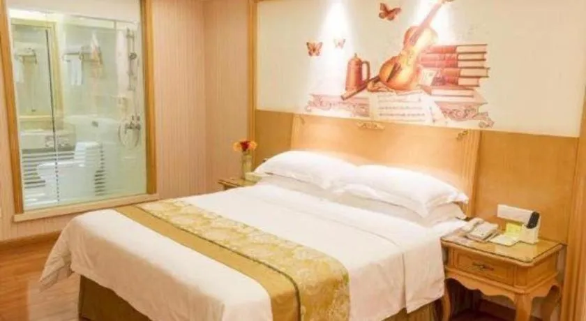 Bed in Vienna International Hotel Guangzhou Jichang Road Huangshi