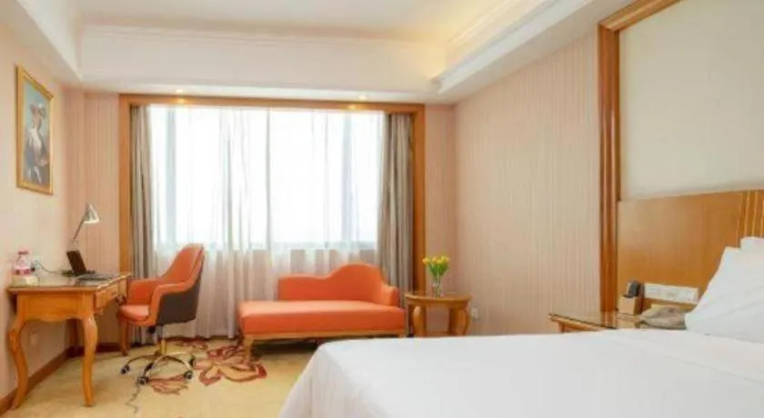 Bed in Vienna International Hotel Guangzhou Jichang Road Huangshi