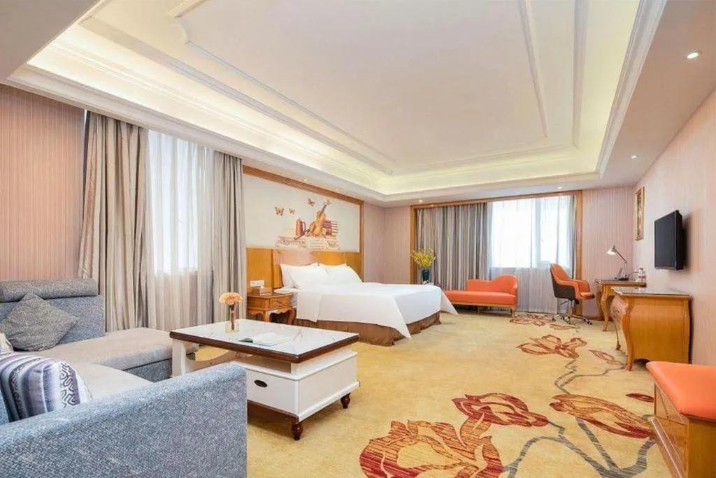Bed in Vienna International Hotel Guangzhou Jichang Road Huangshi