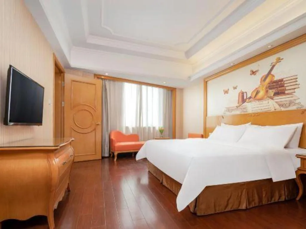 Bed in Vienna International Hotel Guangzhou Jichang Road Huangshi