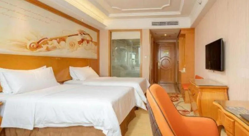 Bed in Vienna International Hotel Guangzhou Jichang Road Huangshi