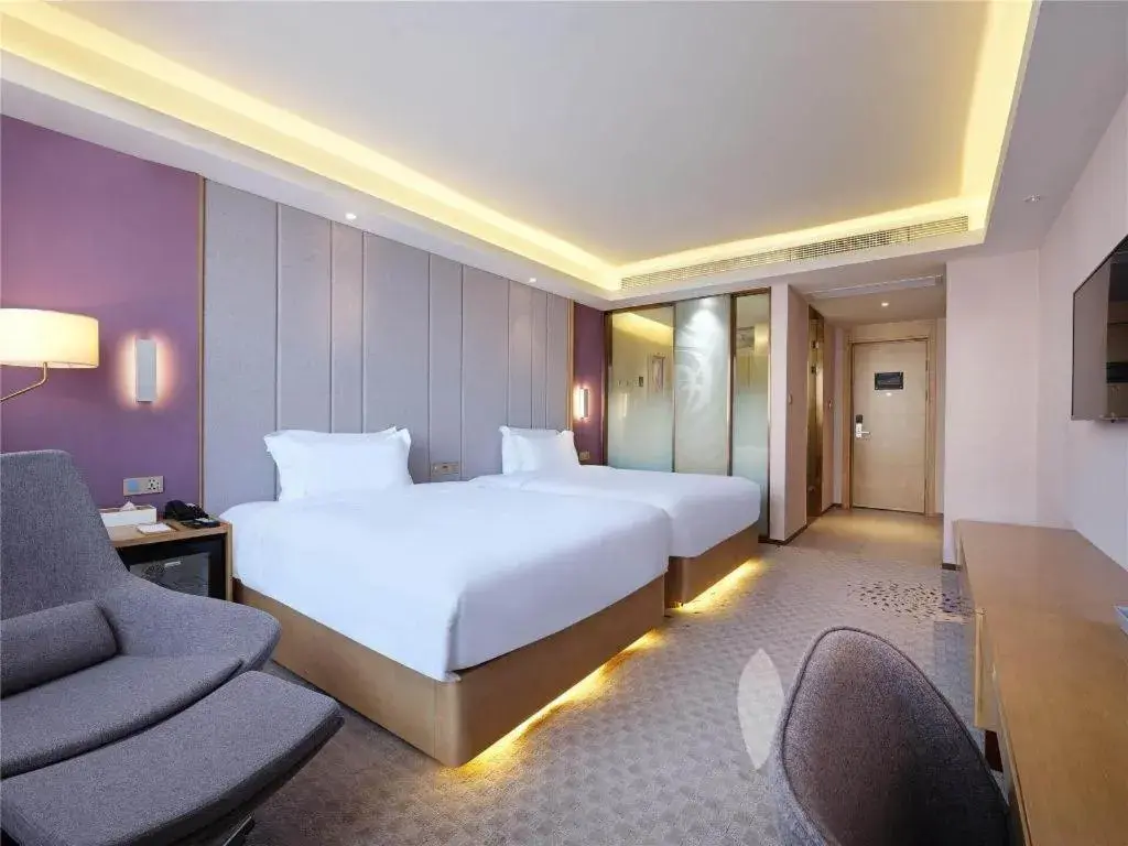 Bed in Lavande Hotel Yangzhou Railway Station Jiangwang RT-Mart Bed in Lavande Hotel Yangzhou Railway Station Jiangwang RT-Mart