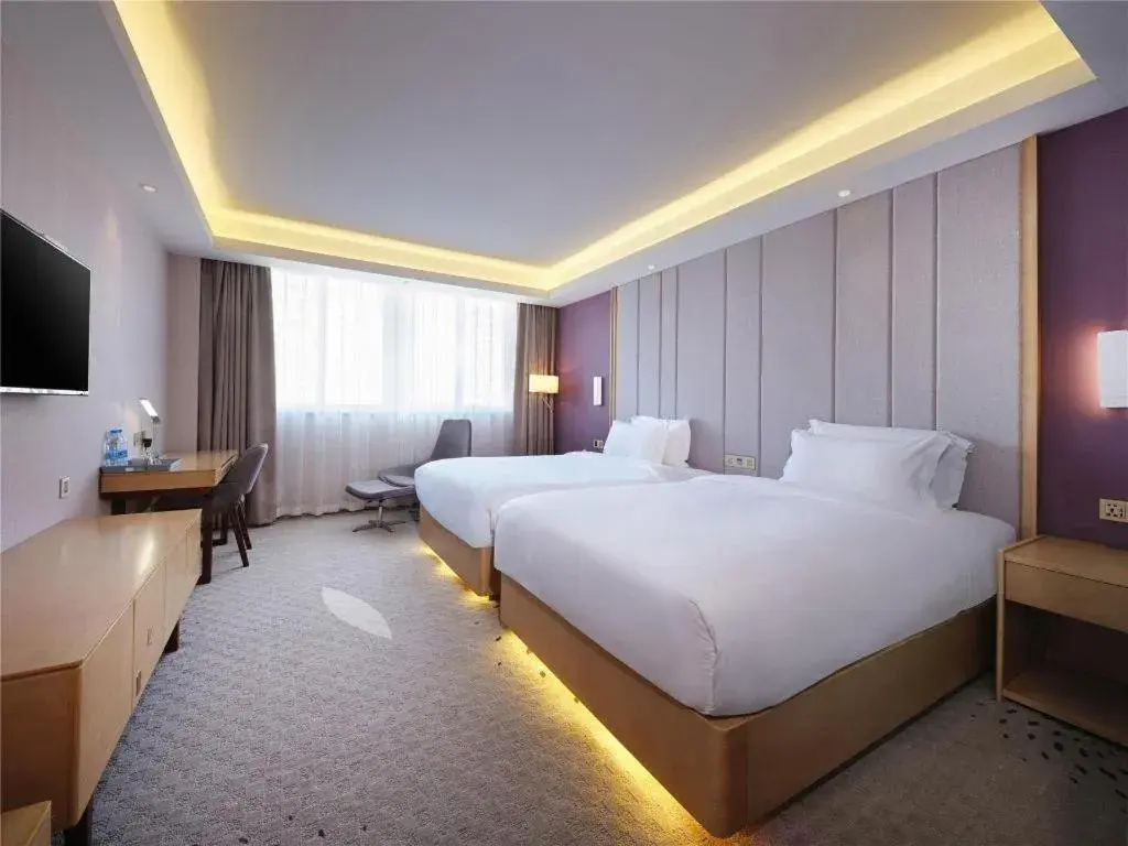 Bed in Lavande Hotel Yangzhou Railway Station Jiangwang RT-Mart Bed in Lavande Hotel Yangzhou Railway Station Jiangwang RT-Mart