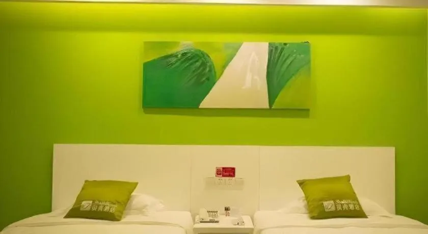 Bed in Shell Qionghai Jinhai Road Hotel