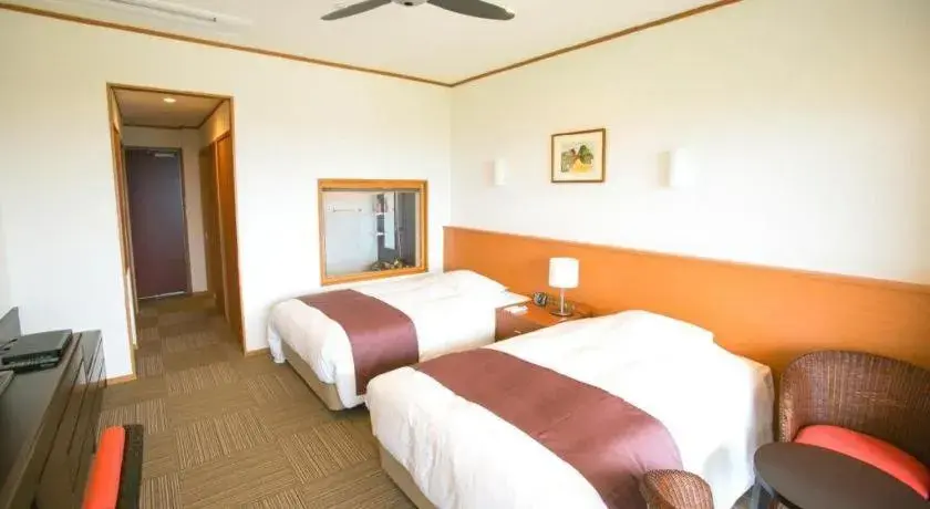 Bed in Sakura Resort Hotel Ishigaki Bed in Sakura Resort Hotel Ishigaki