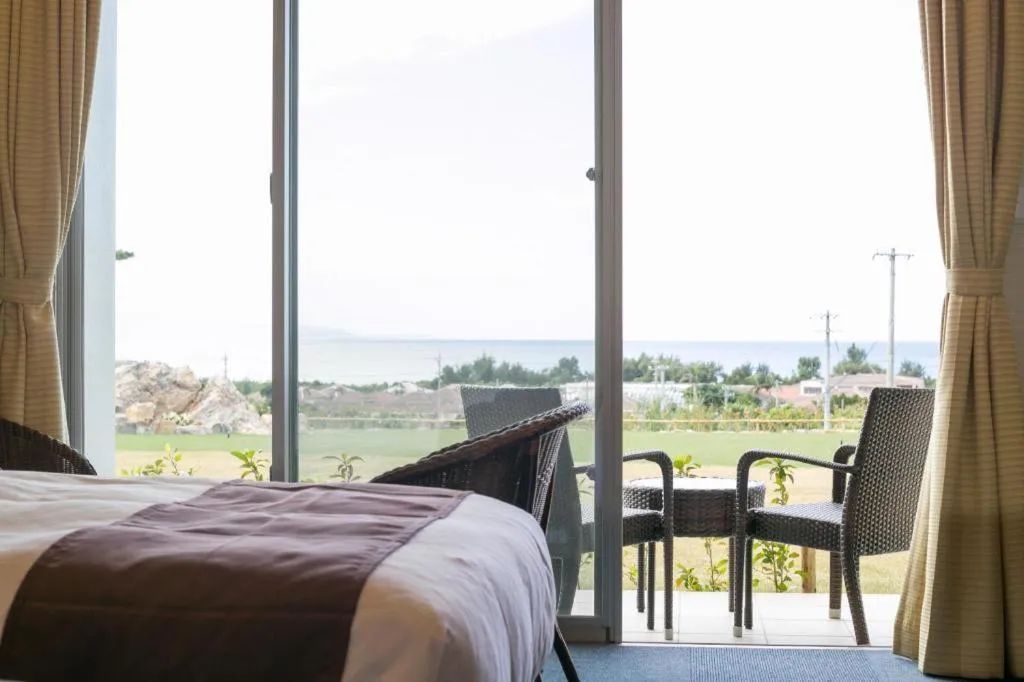 Bed in Sakura Resort Hotel Ishigaki