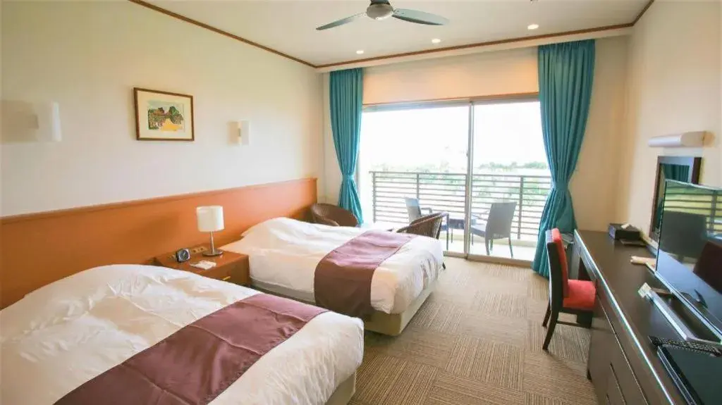 Bed in Sakura Resort Hotel Ishigaki Bed in Sakura Resort Hotel Ishigaki