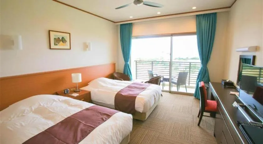 Bed in Sakura Resort Hotel Ishigaki