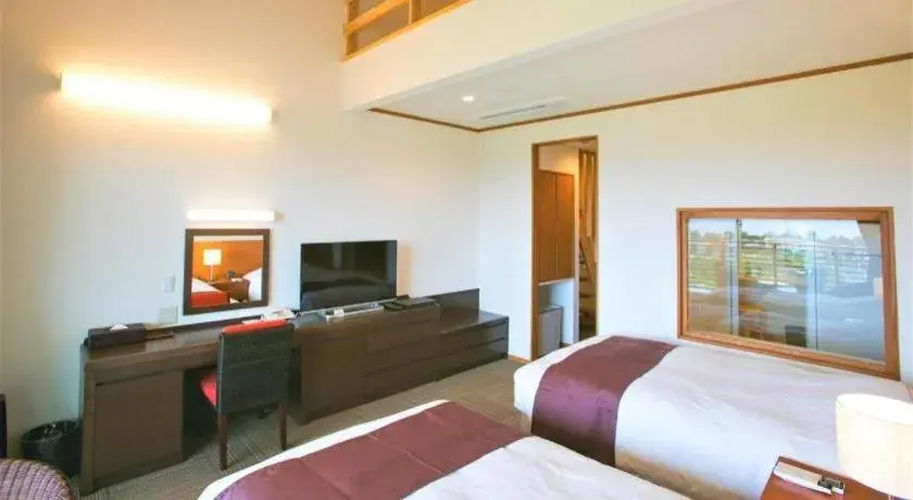 Bed in Sakura Resort Hotel Ishigaki Bed in Sakura Resort Hotel Ishigaki