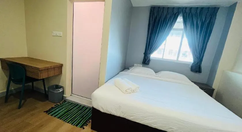 Bed in SemRock Hotel