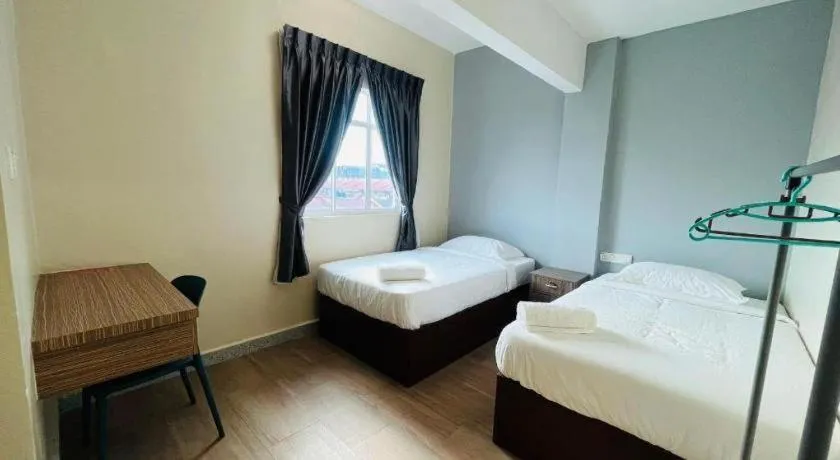 Bed in SemRock Hotel