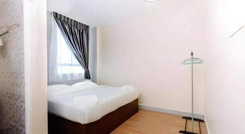 Bed in SemRock Hotel