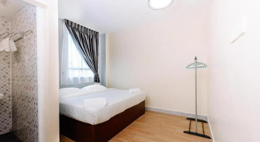 Bed in SemRock Hotel