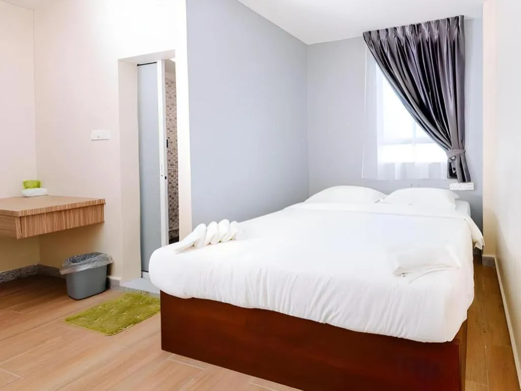 Bed in SemRock Hotel