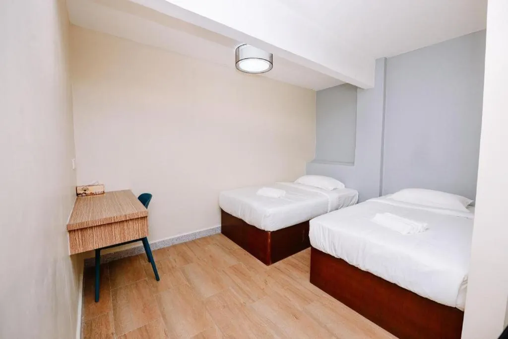 Bed in SemRock Hotel