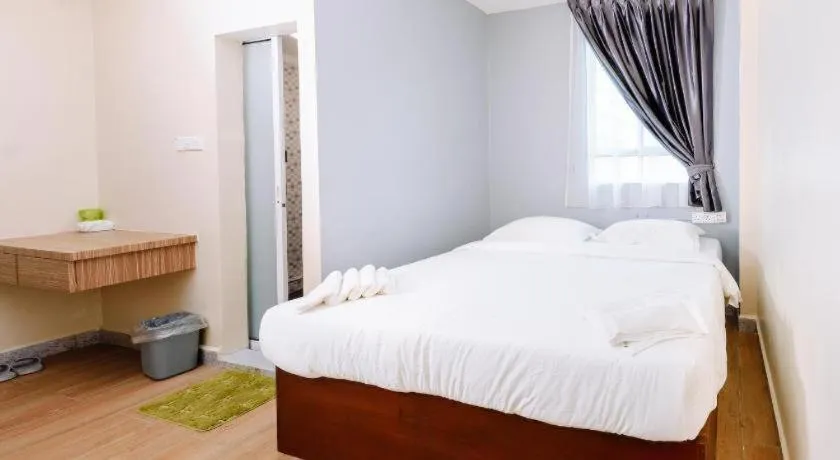 Bed in SemRock Hotel