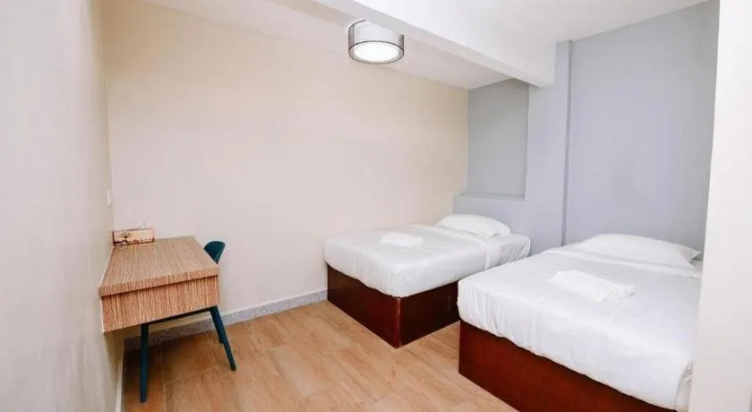 Bed in SemRock Hotel