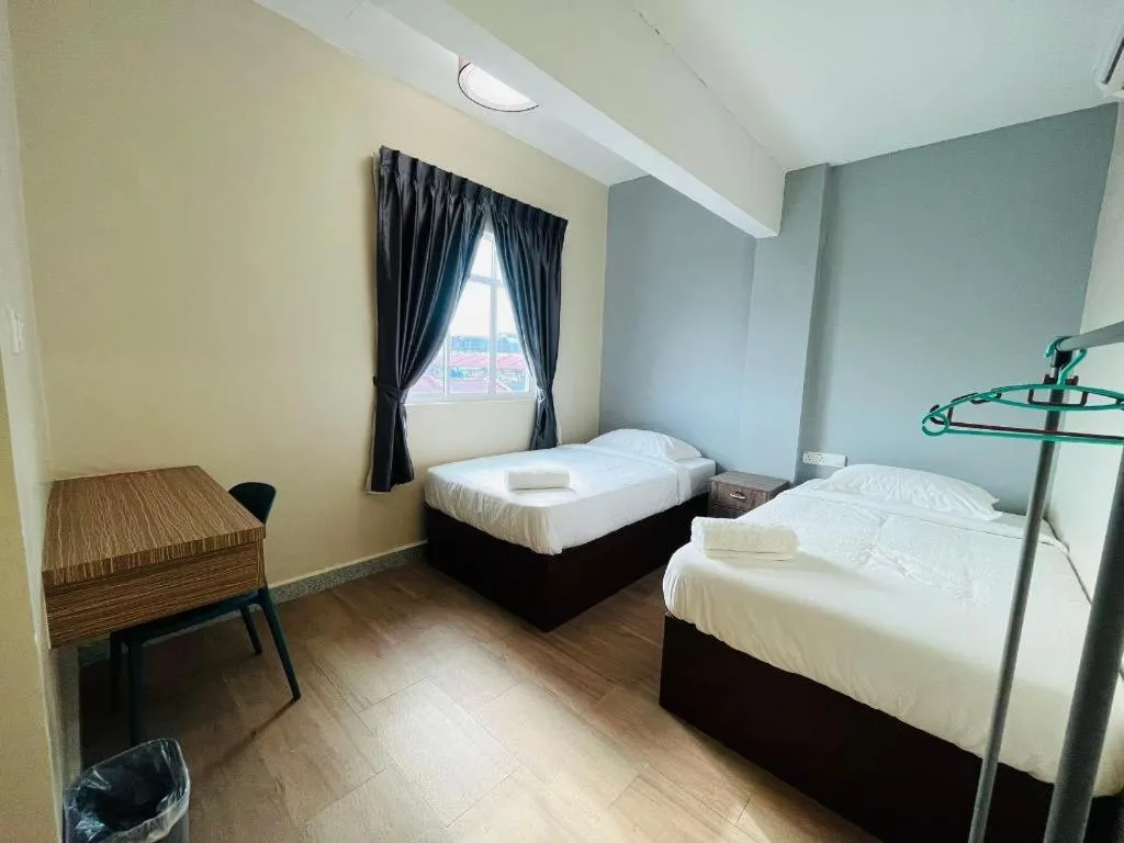 Bed in SemRock Hotel