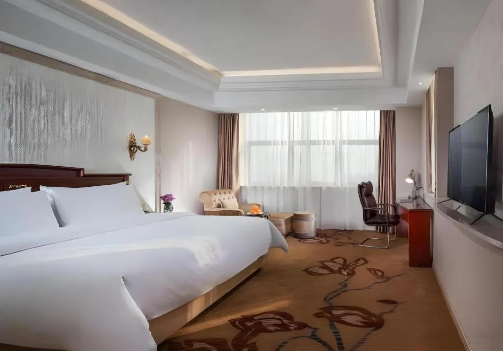 Bed in Vienna International Hotel Wuxi Taihu Expo Center