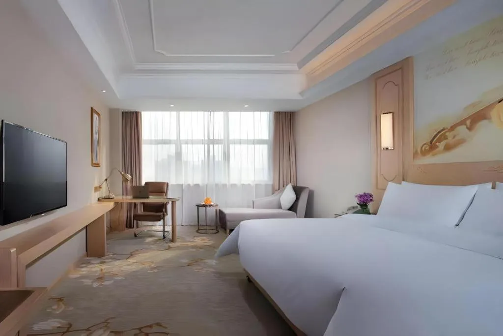 Bed in Vienna International Hotel Wuxi Taihu Expo Center