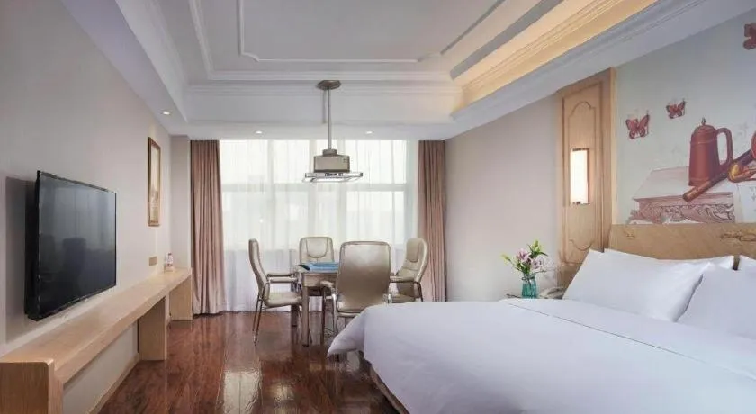 Bed in Vienna International Hotel Wuxi Taihu Expo Center