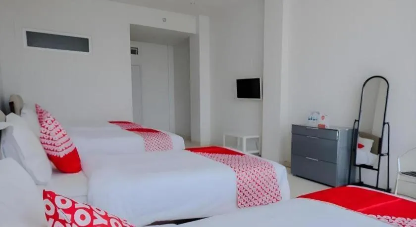 Bed in OYO 1194 Villa Bukit Panderman Residence