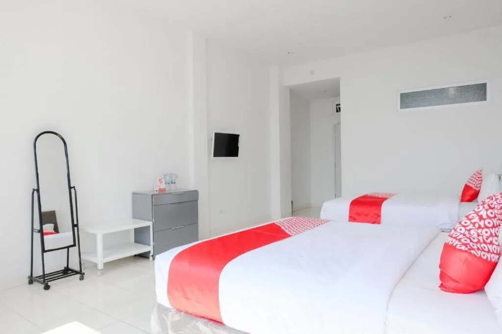 Bed in OYO 1194 Villa Bukit Panderman Residence