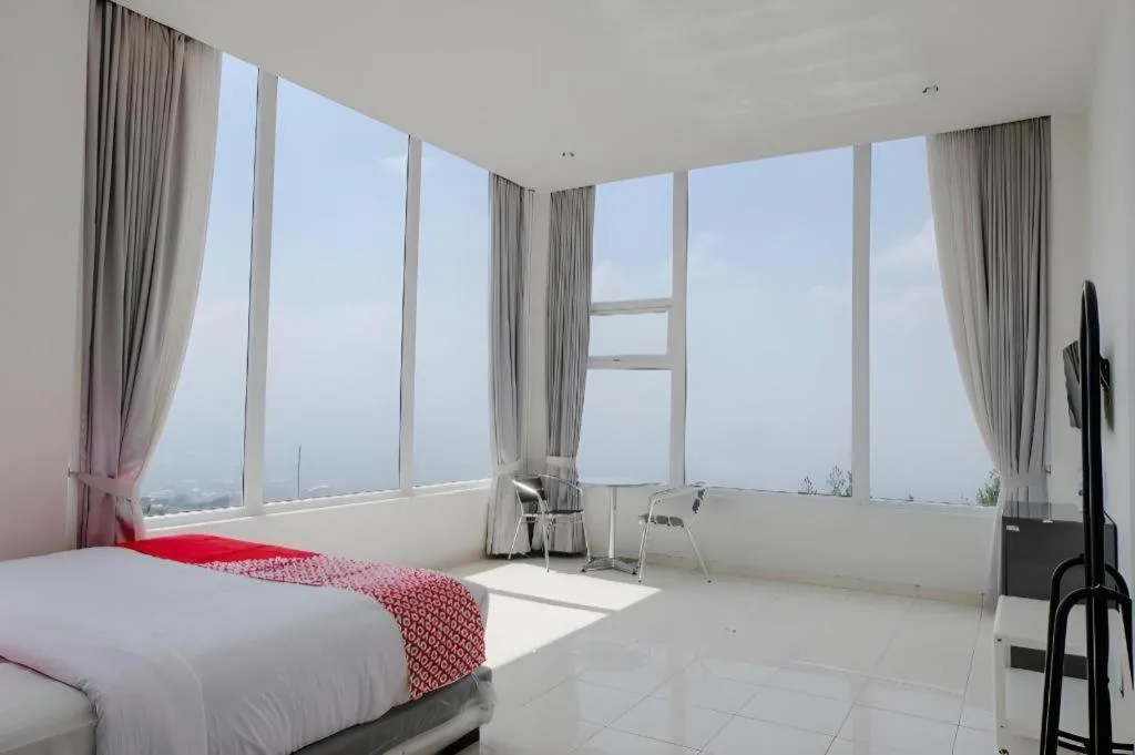 Bed in OYO 1194 Villa Bukit Panderman Residence