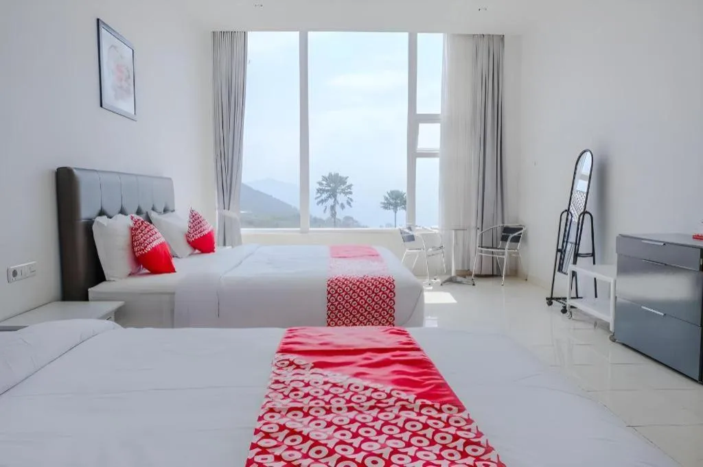 Bed in OYO 1194 Villa Bukit Panderman Residence