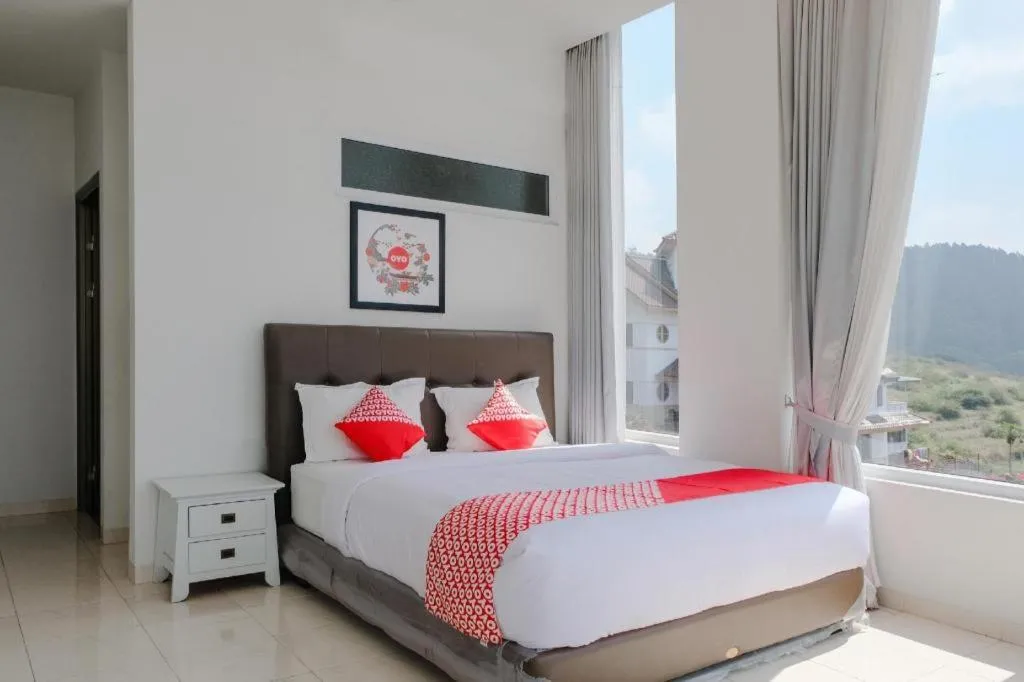 Bed in OYO 1194 Villa Bukit Panderman Residence