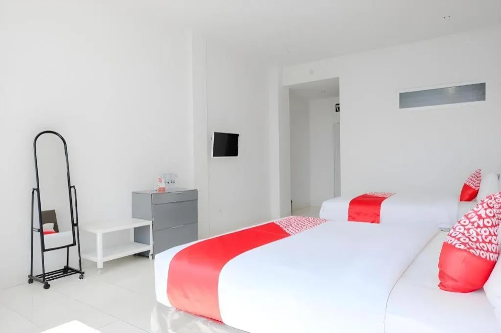 Bed in OYO 1194 Villa Bukit Panderman Residence