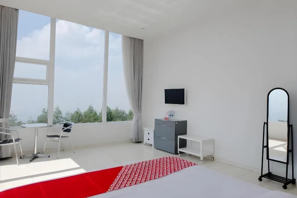 Bed in OYO 1194 Villa Bukit Panderman Residence